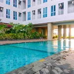 Cozy And Minimalist Studio Apartment At Grand Dhika City By Travelio